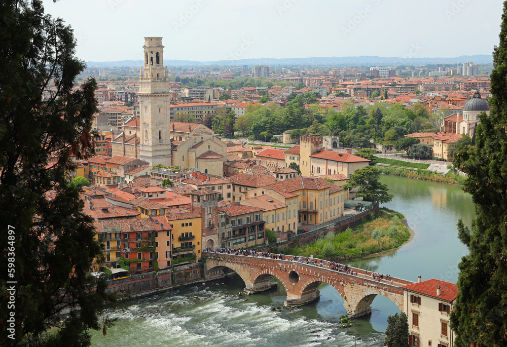 Verona in Italy and old Stone Bridge called PONTE PIETRA over Adige River