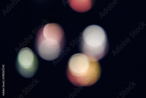 Blurred bokeh effect with sparkle and glow effect for party and glow, shiny, glitter screensavers and wallpapers © PHTASH