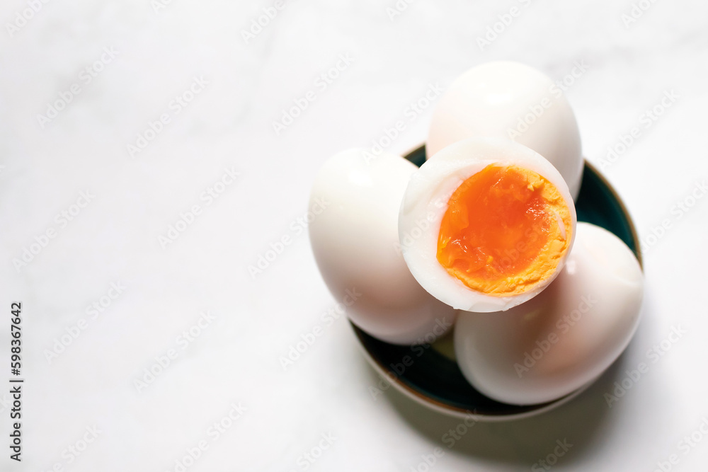 Boiled eggs on white table background. Boiled eggs on white table background.