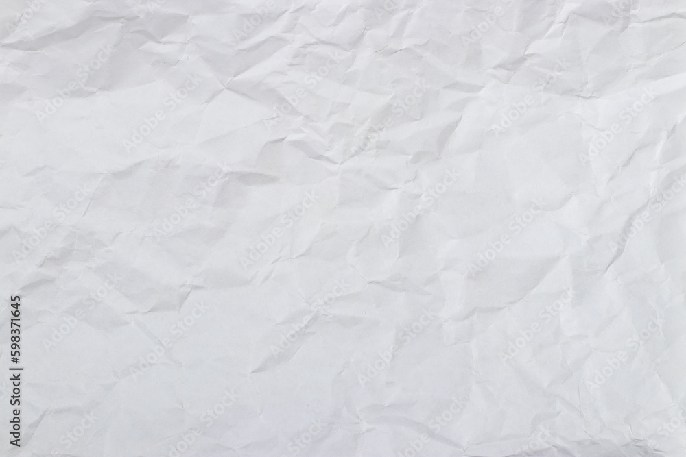White crumpled paper background, texture old for web design screensavers.