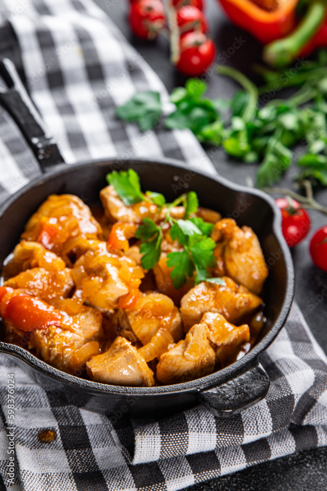 chicken meat tomato sauce spicy Chashushuli meal food snack on the table copy space food background rustic top view chicken meat tomato sauce spicy Chashushuli meal food snack on the table copy space food background rustic top view