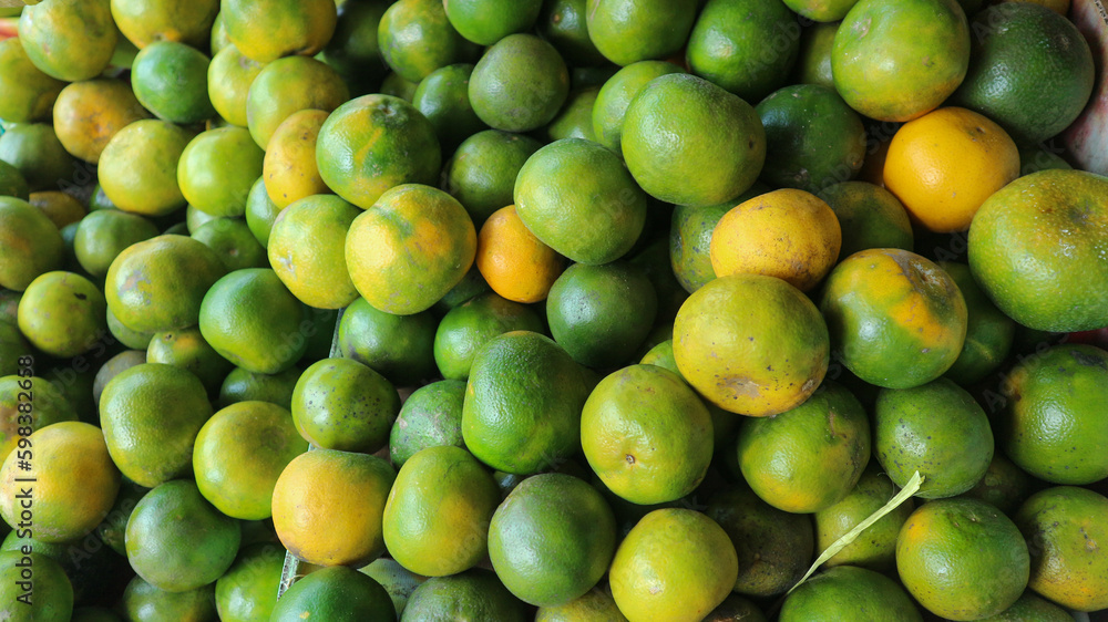 Pile of oranges in a fruit shop. Fresh orange for good juice.