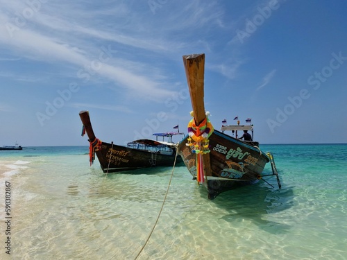 Traditional Langtailboats on shore of Coconut island in Thailand