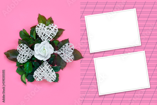 Wallpaper Mural Beautiful white roses with green foliage and heart for Valentine's Day on pink paper background. Creative greeting card. Torontodigital.ca