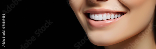 Close up of smile with white healthy teeth on black background. Dental care. Dentistry concept.Banner