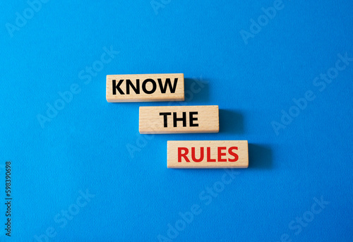 Know the rules symbol. Wooden blocks with words Know the rules. Beautiful blue background. Business and Know the rules concept. Copy space.
