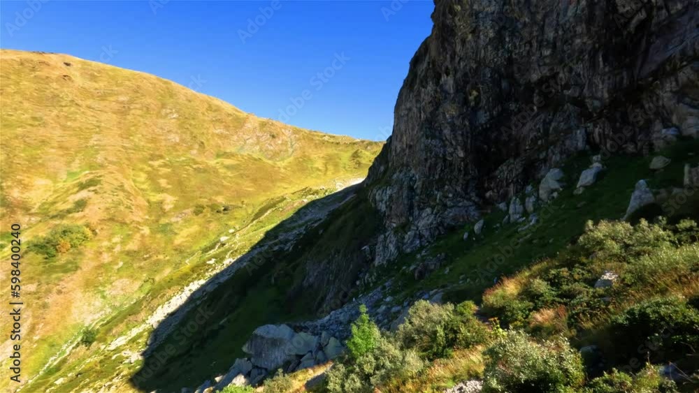 pretty mountain ridge valley or meadow in Arkhyz at sunny summertime day pretty mountain ridge valley or meadow in Arkhyz at sunny summertime day