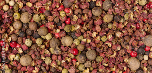 Various mixture of peppers, red, black and allspice. Seasoning for cooking
