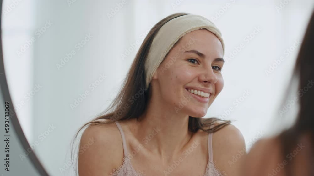 White teeth woman smiling in bathroom mirror. Closeup happy lady enjoying smile Generative AI White teeth woman smiling in bathroom mirror. Closeup happy lady enjoying smile Generative AI