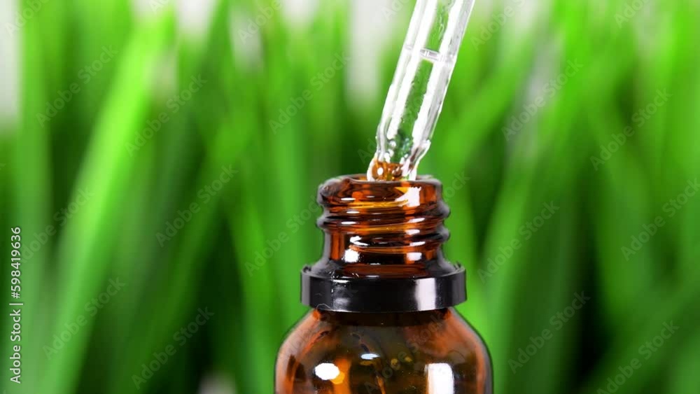 Bottle with pipette wit oil, serum squalane.dripping golden oil into a bottle from a glass pipette.Facial gel, serum,essential oil.Cosmetic mock up. Green gras cosmetic background. Close Generative AI Bottle with pipette wit oil, serum squalane.dripping golden oil into a bottle from a glass pipette.Facial gel, serum,essential oil.Cosmetic mock up. Green gras cosmetic background. Close Generative AI