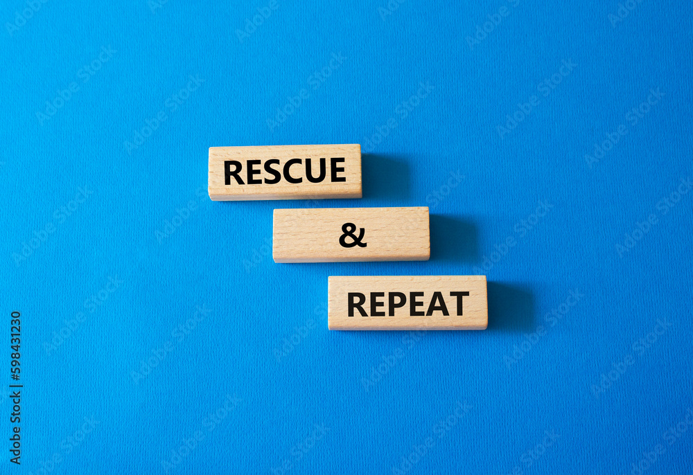 Rescue and Repeat symbol. Wooden blocks with words Rescue and Repeat. Beautiful blue background. Business and Rescue and Repeat concept. Copy space. Rescue and Repeat symbol. Wooden blocks with words Rescue and Repeat. Beautiful blue background. Business and Rescue and Repeat concept. Copy space.
