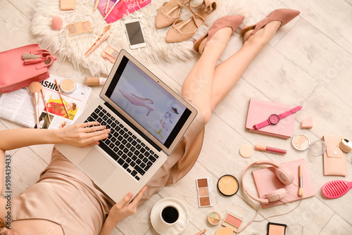 Woman with laptop and acces...
