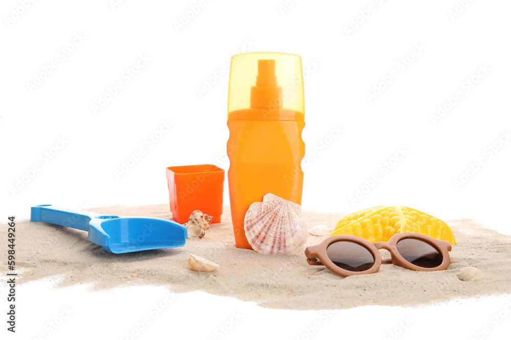 Sunscreen cream for baby with beach accessories, seashells and sand on white background Sunscreen cream for baby with beach accessories, seashells and sand on white background