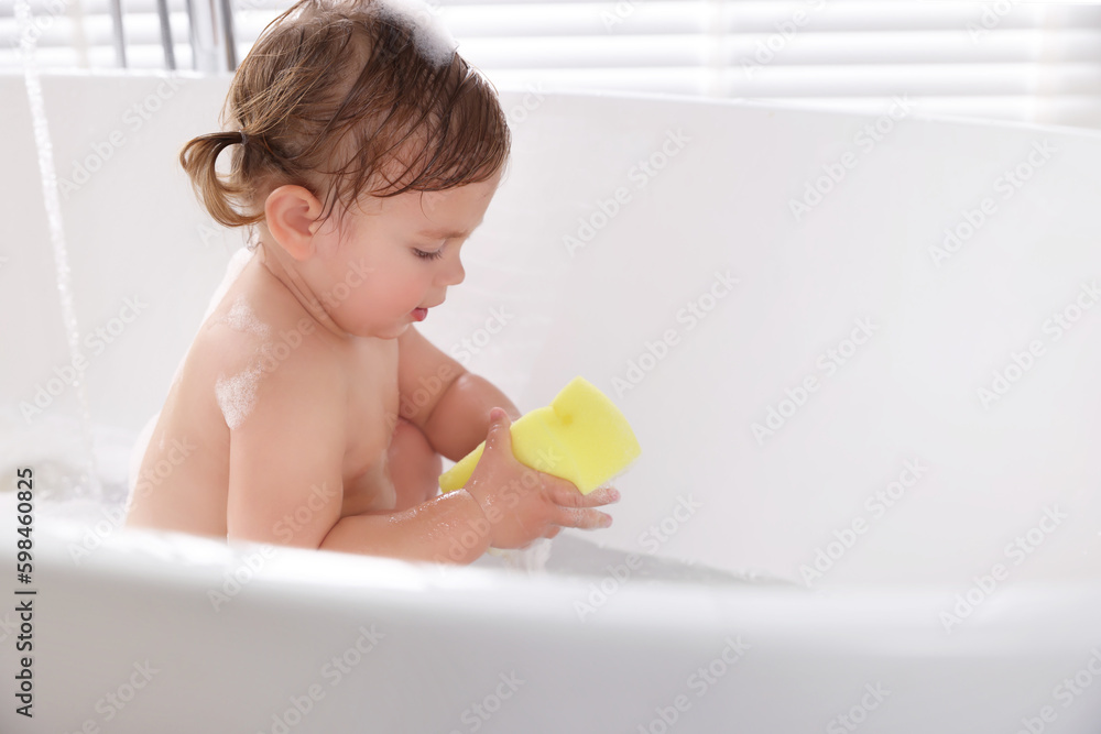 Cute little girl with bast wisp taking bubble bath. Space for text Cute little girl with bast wisp taking bubble bath. Space for text