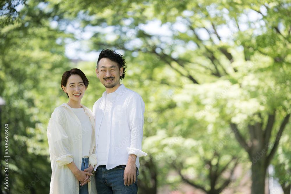 Image of a happy couple or married couple Beard and beautiful woman Wide angle Looking at the camera Image of a happy couple or married couple Beard and beautiful woman Wide angle Looking at the camera