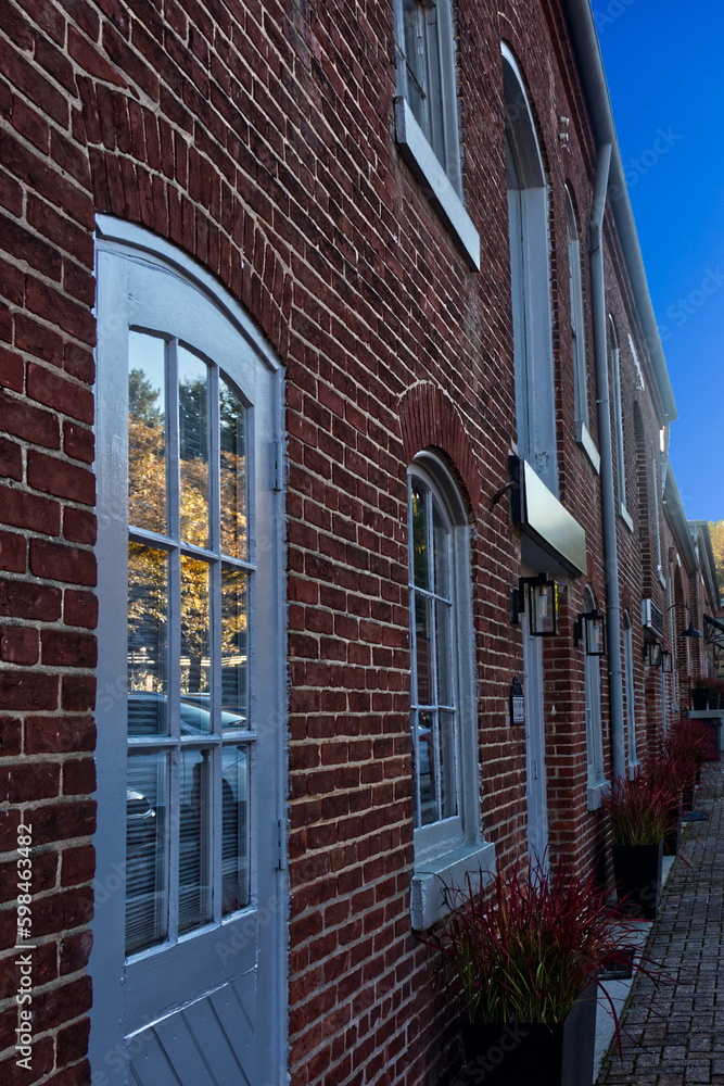 Beautifully painted red brick and glass windows of the East coast, Laurel, MD, USA