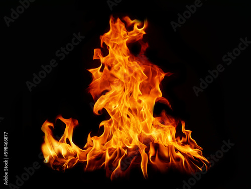 Flame Flame Texture For Strange Shape Fire Background Flame meat that is burned from the stove or from cooking. danger feeling abstract black background Suitable for banners or advertisements. © sainan