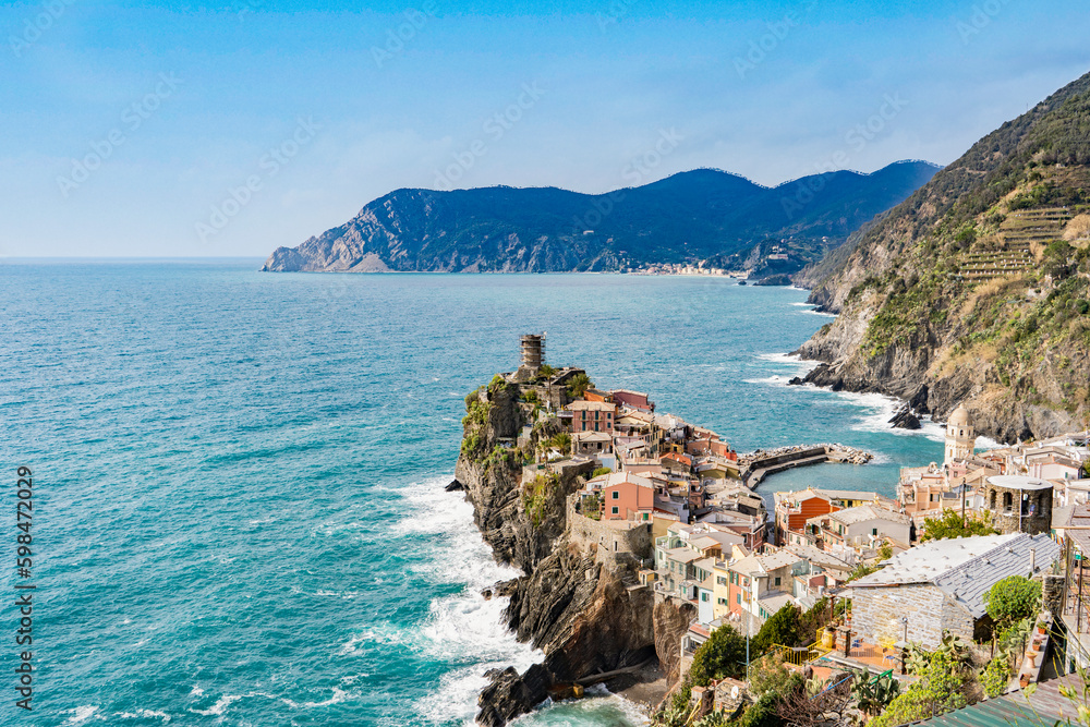 Scenic view of ocean and Vernazza village located in Cinque Terre, Italy