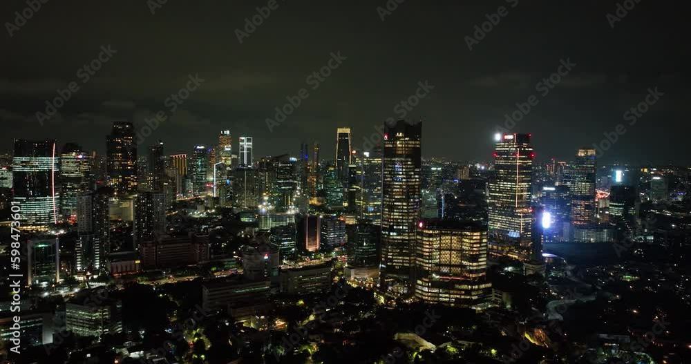 Night downtown Jakarta with high-rise buildings. Generative AI Night downtown Jakarta with high-rise buildings. Generative AI