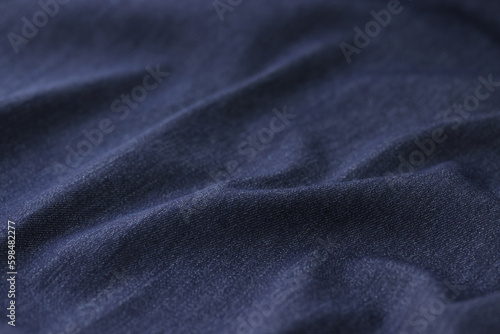 Crumpled blue fabric for sewing clothes for bed linen store