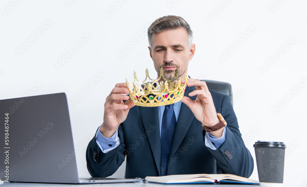 mature businessman in suit wear crown at the office mature businessman in suit wear crown at the office