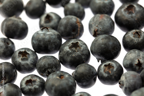 Ripe blueberries isolated on white background. Macro.