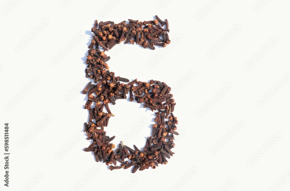 6 Six Number Written with Dry Cloves Isolated on White Background 6 Six Number Written with Dry Cloves Isolated on White Background