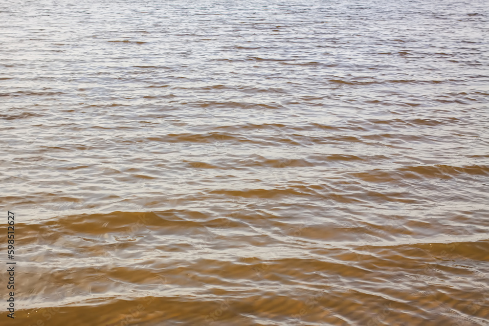 Transparent water on the Baltic Sea coast on a windy spring day. Jurmala, Latvia. Transparent water on the Baltic Sea coast on a windy spring day. Jurmala, Latvia.