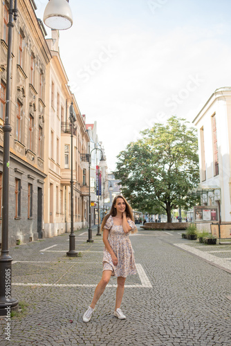 woman walking in the street. person walking in the city