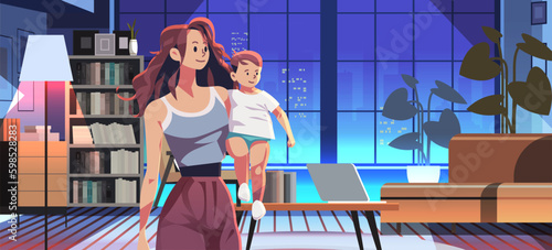 happy mother with little son spending time together motherhood concept modern living room interior