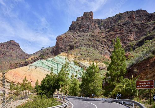 Fuente de los Azulejos seen from the road that leads from Mogán to the Aldea de San Nicolás. Emerald green rock formation in the mountains of the Inagua Integral Nature Reserve, in Gran Canaria.