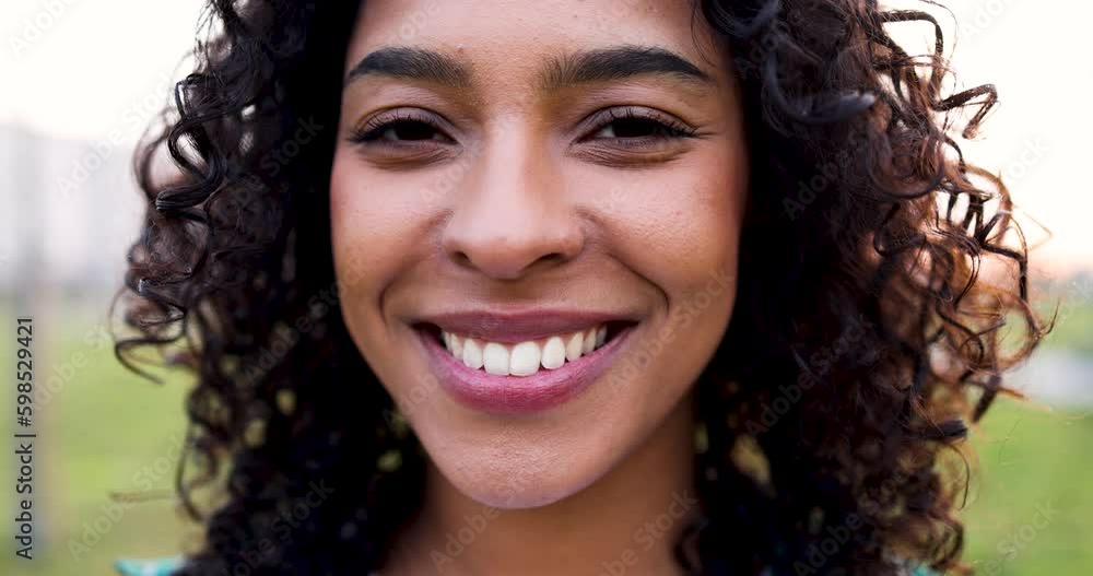Close-up of face of beautiful smiling woman Close-up of face of beautiful smiling woman