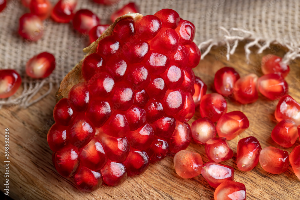 red pomegranate without peel with lots of sweet seeds red pomegranate without peel with lots of sweet seeds