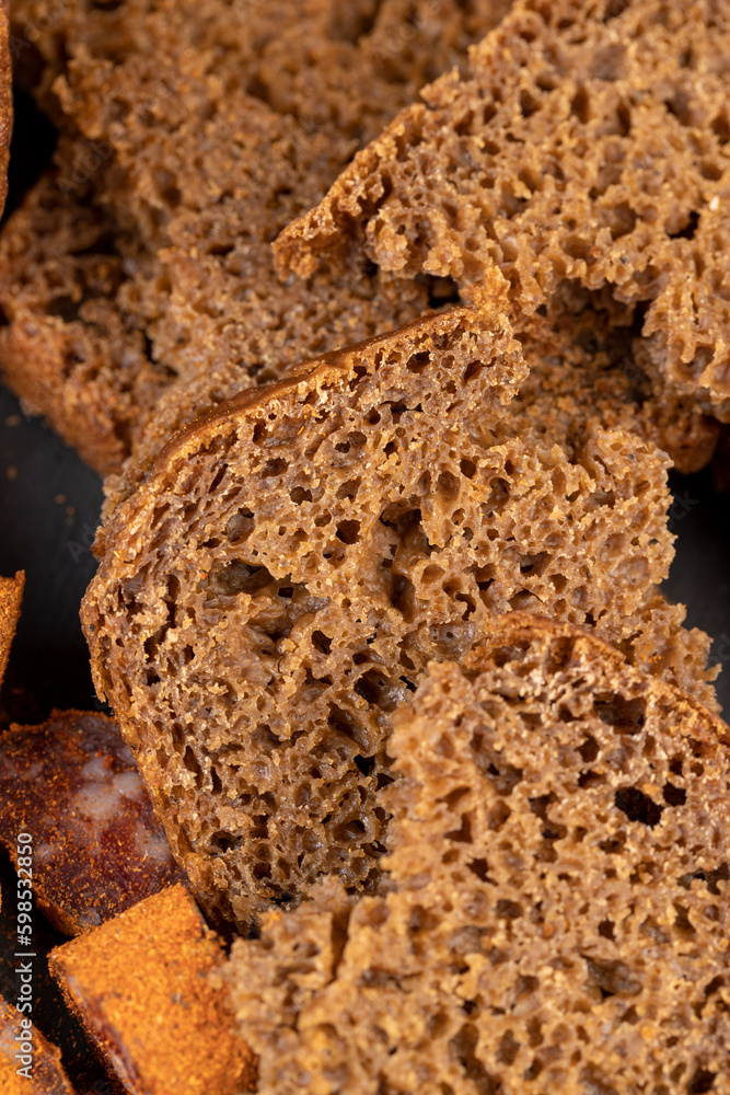pieces of black rye bread from mixed wheat flour with rye flour pieces of black rye bread from mixed wheat flour with rye flour