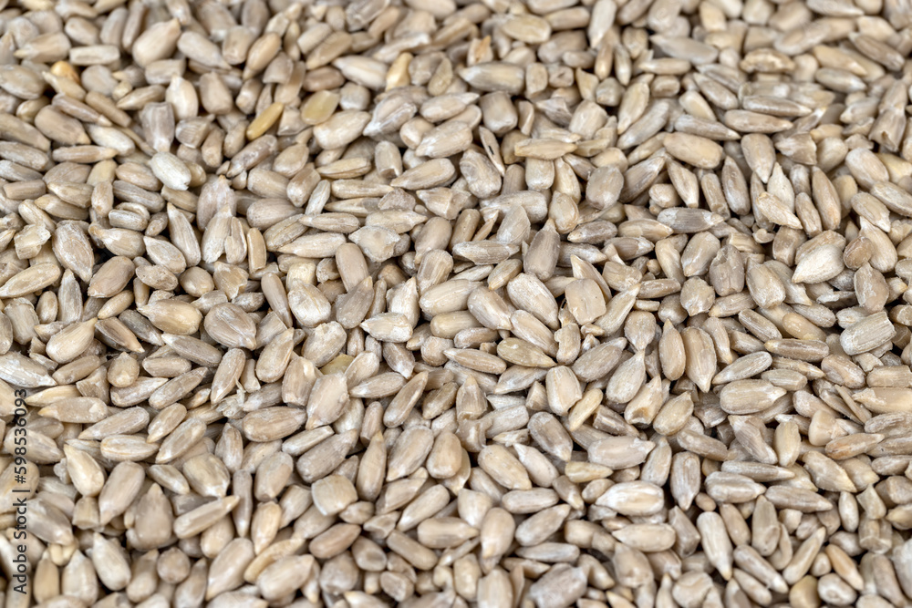 Sunflower seeds peeled from the black shell Sunflower seeds peeled from the black shell