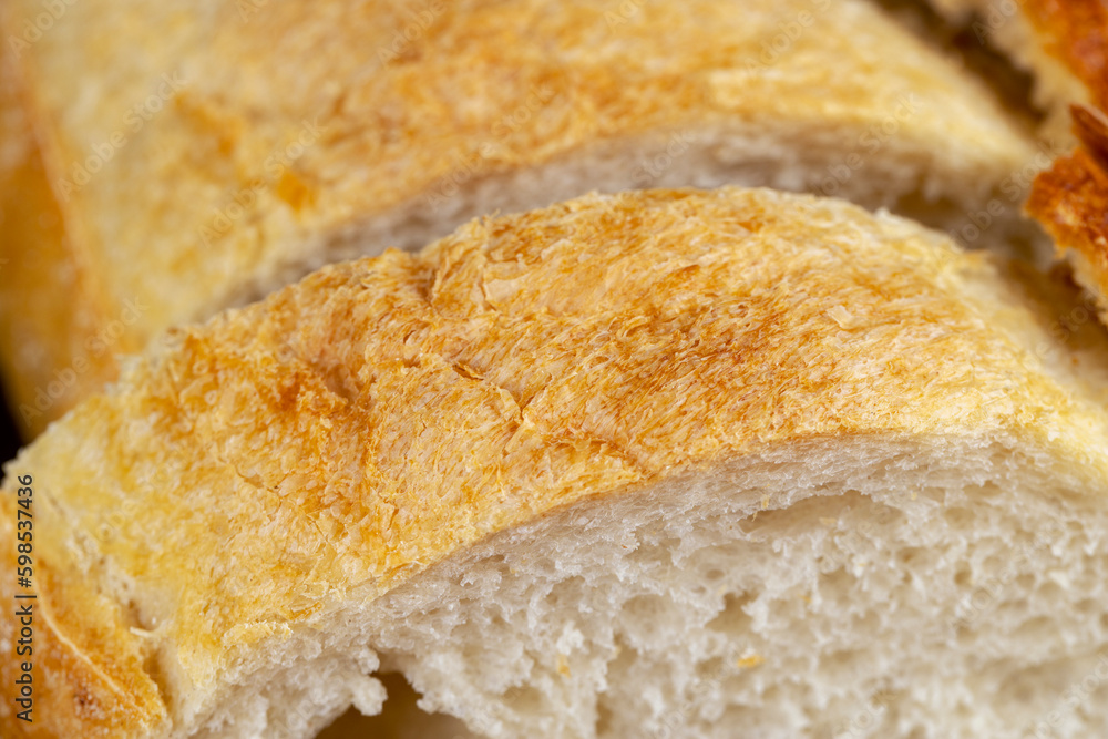 slices of sliced loaf of wheat bread slices of sliced loaf of wheat bread