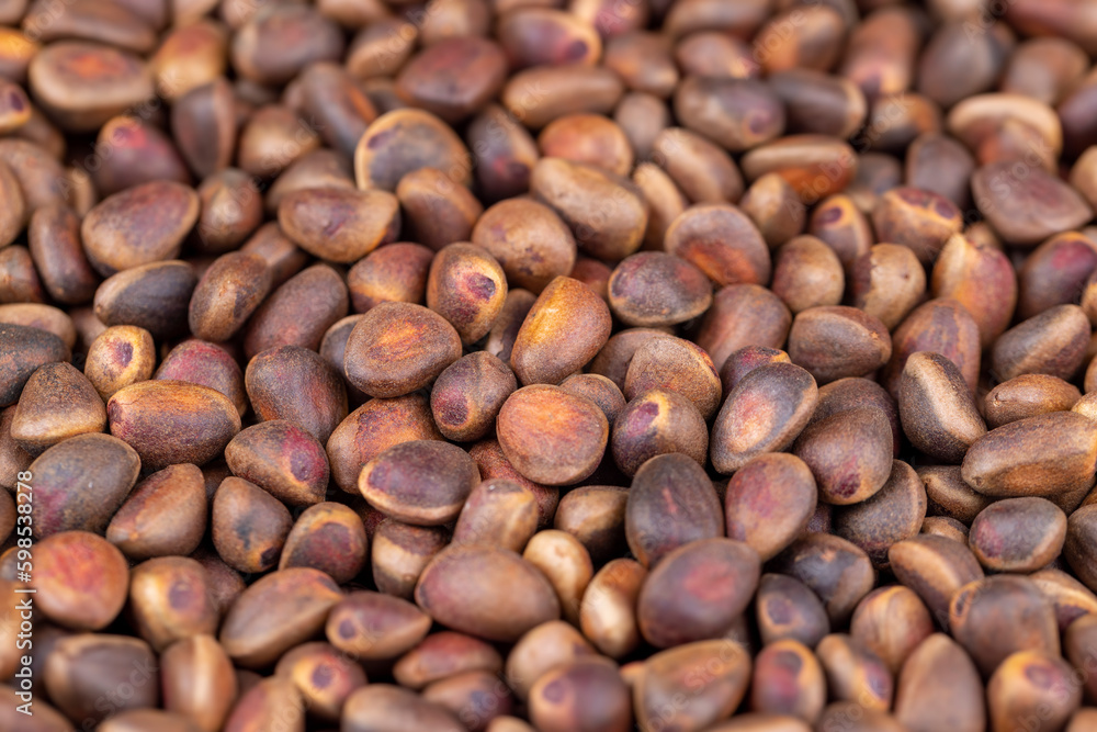a bunch of pine nuts in the shell a bunch of pine nuts in the shell