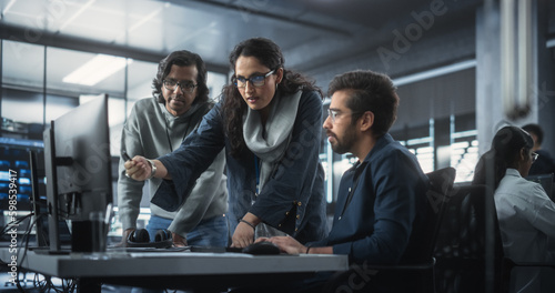 Team of Three Diverse South Asian Software Developers Talk, Discuss a Technological Project. Empowered Indian Female Specialists and Two Colleagues Work on Digital Software as a Service Business