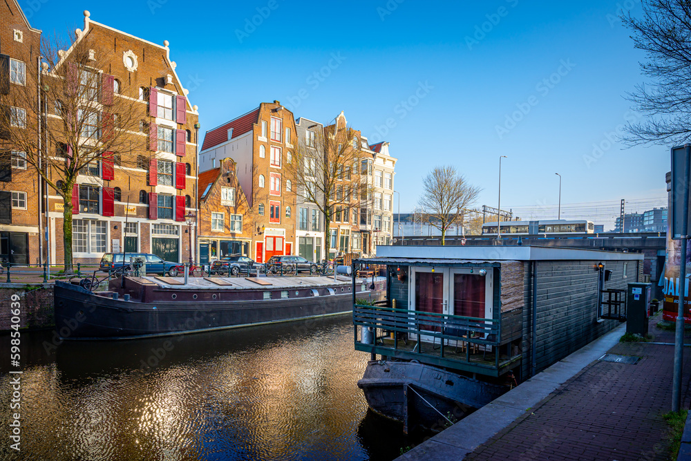 Traditional houses on the banks of the canal in Amsterdam.