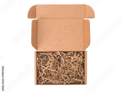 Mockup. Open cardboard box with paper filling isolated on white background top view. © Polina Ponomareva
