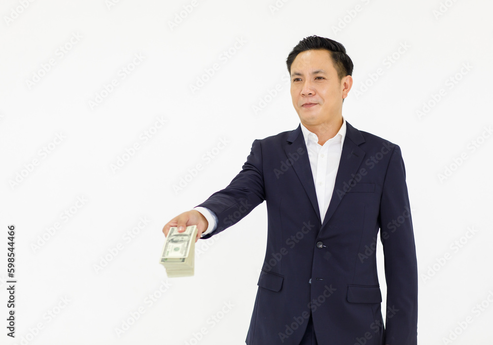 Asian professional successful rich wealthy millionaire male businessman entrepreneur accountant in formal business suit standing holding stack of hundred dollar banknote currency on white background Asian professional successful rich wealthy millionaire male businessman entrepreneur accountant in formal business suit standing holding stack of hundred dollar banknote currency on white background