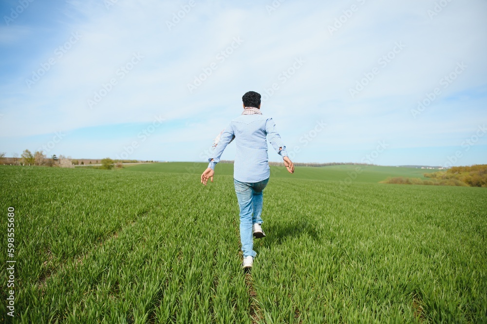 Indian farmer in his Wheat field