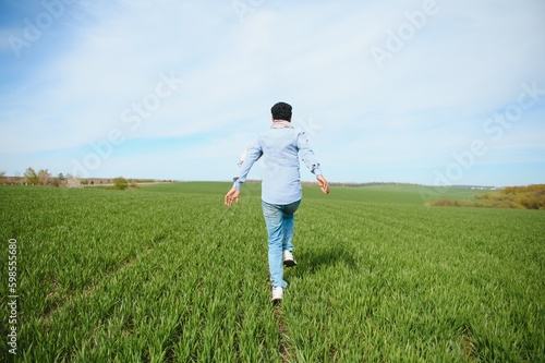 Indian farmer in his Wheat field