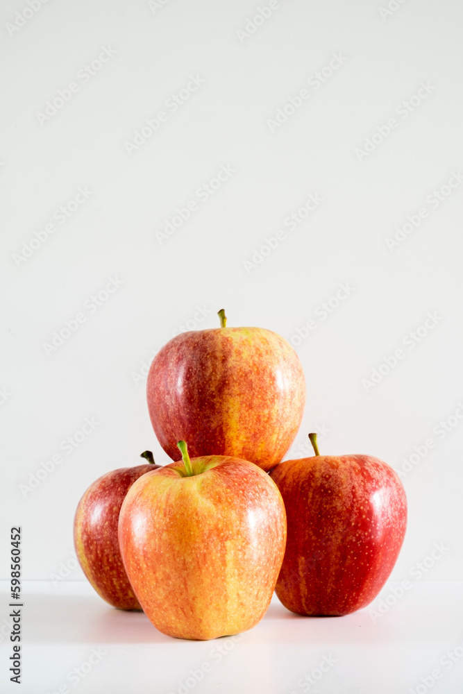Three fresh red apples on a white background. Three fresh red apples on a white background.