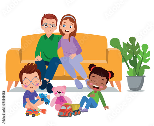 A family sitting on the floor with toys and a cat.