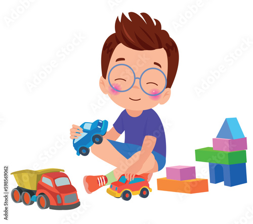 A boy playing with toy cars and a house made of blocks.