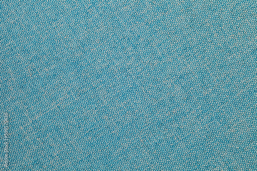 Blue light fabric close-up, uniform texture background photo