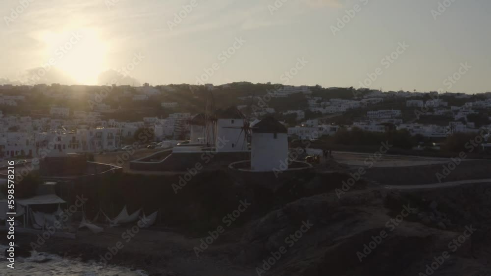 Sunrise behind the famous windmills of Mykonos, Greece Sunrise behind the famous windmills of Mykonos, Greece