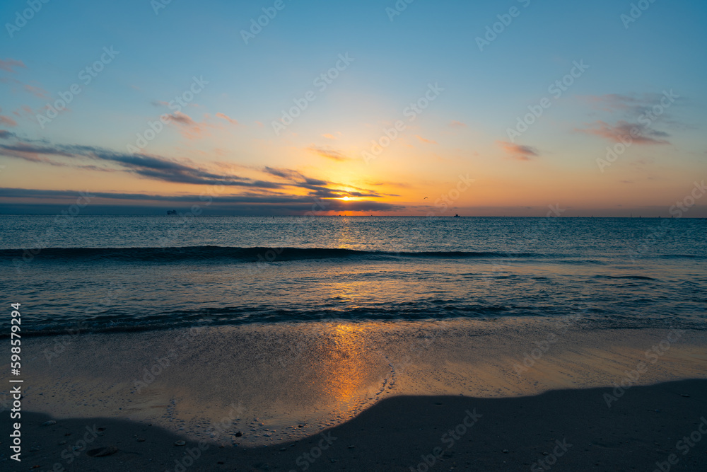 beautiful skyscape with sea water on the summer beach