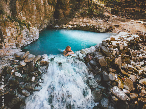 Tableau sur toile Girl in a hot spring relaxing outdoor healthy lifestyle travel in Albania, girl